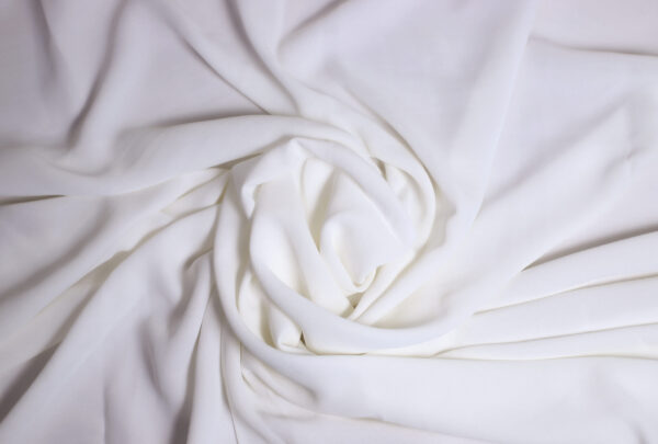 SRB Georgette fabric with a lightweight, sheer texture and a soft, flowing drape, ideal for elegant outfits and stylish designs